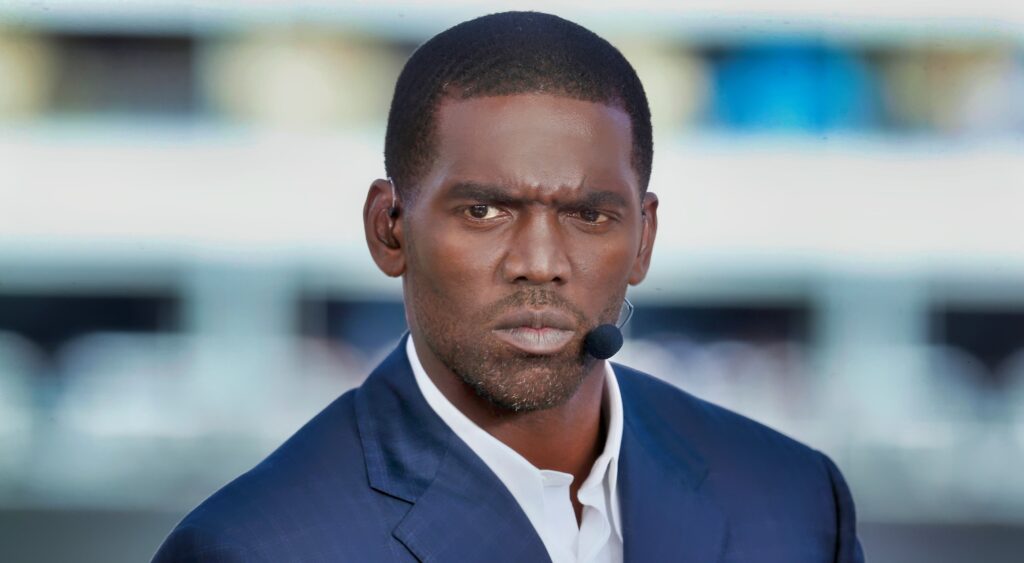 Randy Moss in blue suit