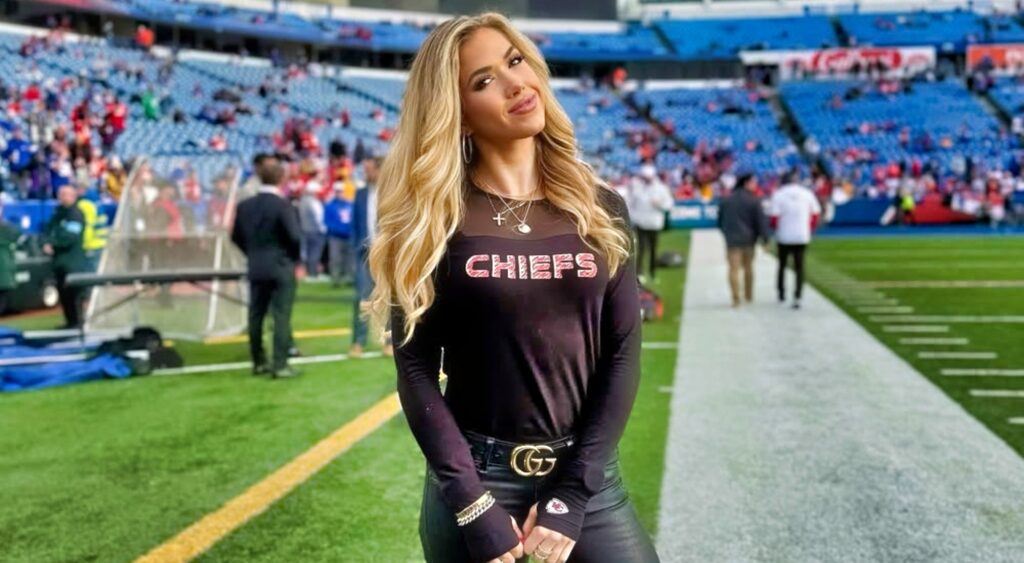 Gracie Hunt posing on football field