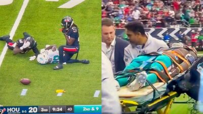 Miami Dolphins wide receiver Grant DuBose being carted off