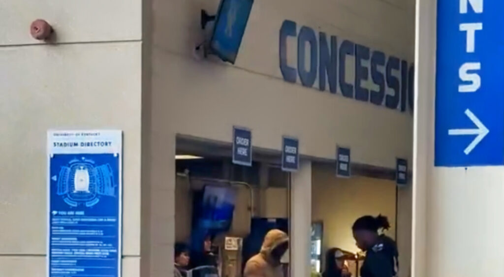 Kentucky Wildcats player at concession stand during game