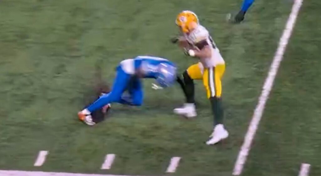 Kerby Joseph going low for a tackle on Packers player