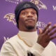 Lamar Jackson speaking to reporters