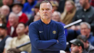 Nuggets' locker room is divided over the conflict between Michael Malone and Calvin Booth