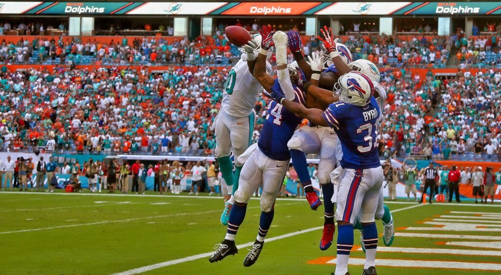 Brandon Gibson of the Miami Dolphins goes up for a last second hail mary during a game against the Buffalo Bills at Sun Life Stadium on October 20, 2013 in Miami Gardens, Florida.