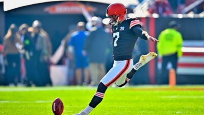 Dustin Hopkins of the Cleveland Browns takes the opening kick-off during the game against the Arizona Cardinals