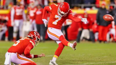 Harrison Butker of the Kansas City Chiefs kicks the game winning field goal to defeat the Cincinnati Bengals 23-20 in the AFC Championship Game