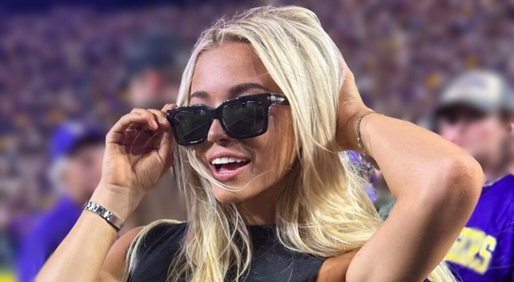 Olivia Dunne poses at LSU football game.