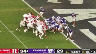 Rutgers football team and Kansas State at goal line