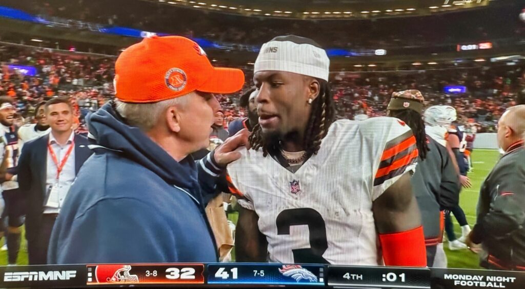 Jerry Jeudy and Sean Payton speak during postgame handshakes.