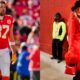 Taylor Swift inside Stadium and Travis Kelce in uniform