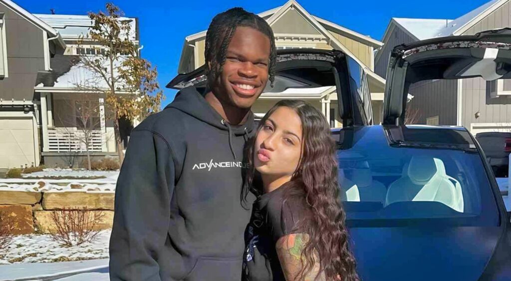 Travis Hunter posing with Leanna