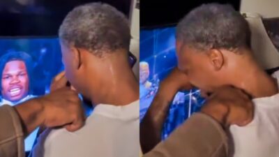 Photos of Travis Hunter Sr. crying