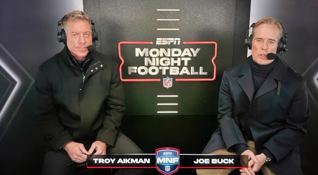 Troy Aikman and Joe Buck in the broadcast booth.