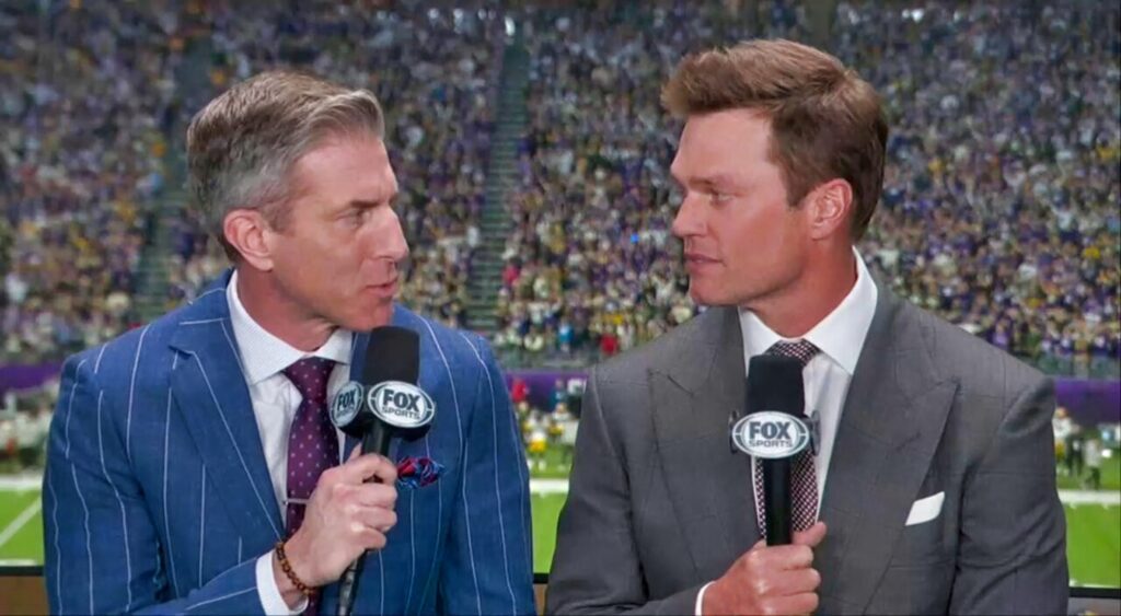 Kevin Burkhardt and Tom Brady speaking on television.