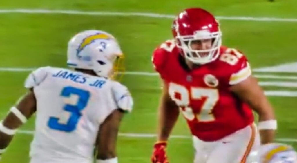 Derwin James and Travis Kelce lining up for a play.