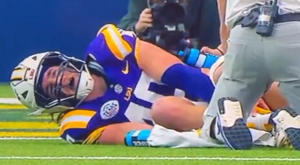 Whit Weeks of LSU Tigers reacts after suffering ankle injury.