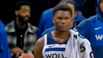 Cameras capture Anthony Edwards' funny reaction after getting a tech foul for flexing on the bench during a game