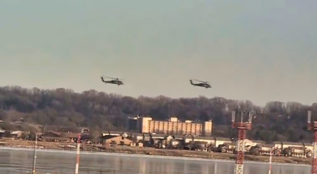 Black Hawk helicopters flying 