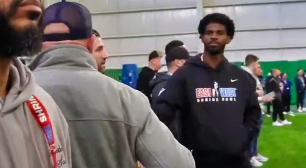 Brian Daboll and Shedeur Sanders shaking hands