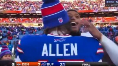 Buffalo Bills' Josh Allen and Courtland Sutton hugging on field