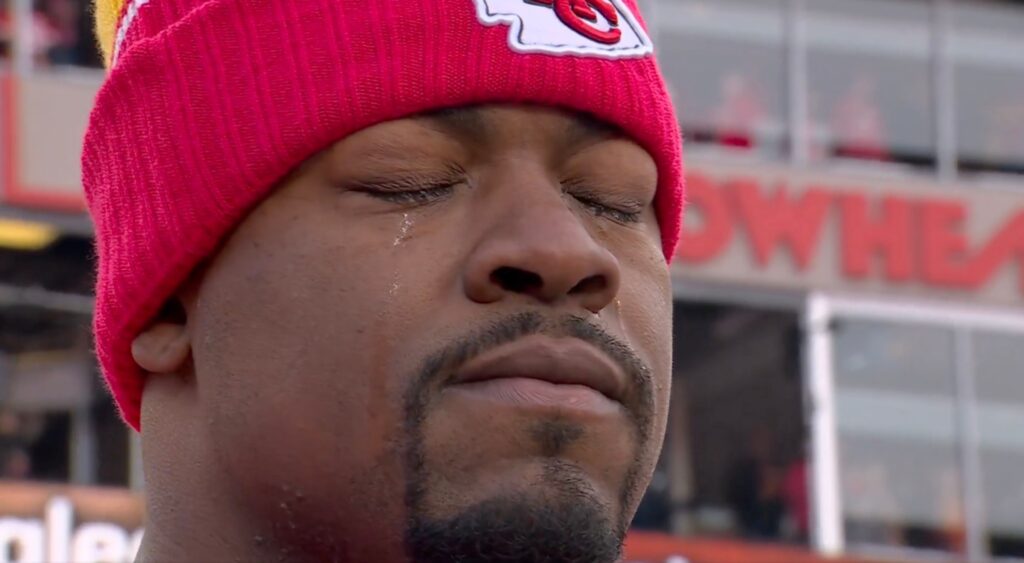 Chris Jones crying during the anthem.