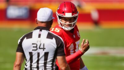 Patrick Mahomes and a ref talking