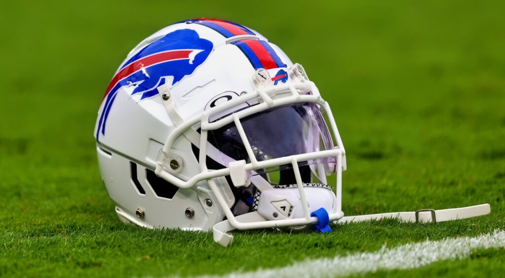 Buffalo Bills helmet shown on field. The team has signed Frank Gore Jr.