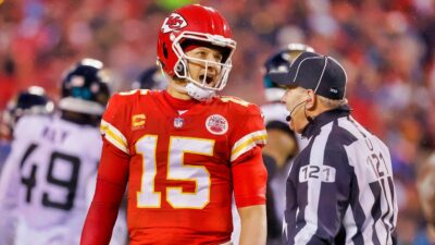 Kansas City Chiefs QB Patrick Mahomes and ref on field