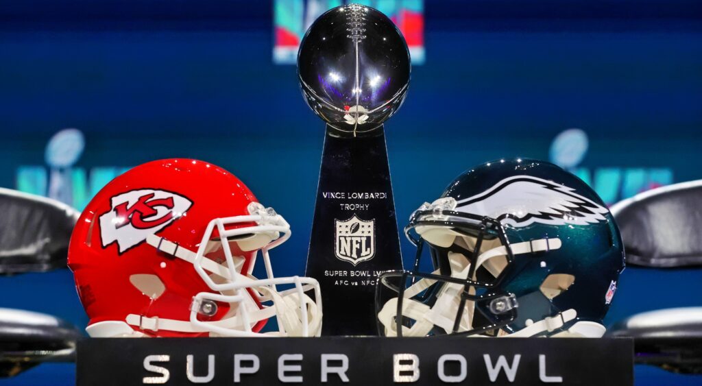 Chiefs & Eagles helmets next to Lombardi Trophy for Super Bowl