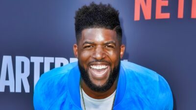 Emmanuel Acho posing at NetFlix event