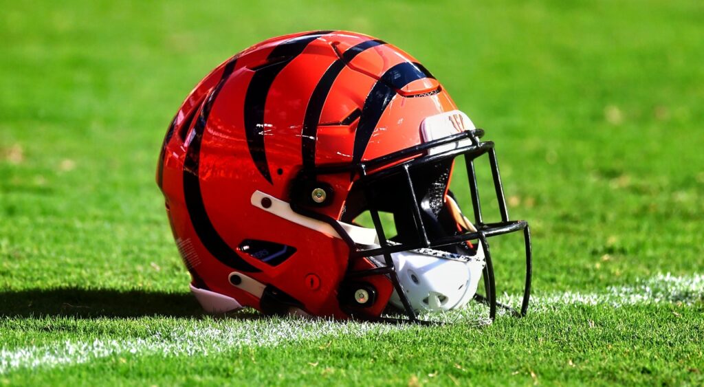 Cincinnati Bengals helmet shown on field. The team benched rookie wide receiver Jermaine Burton.