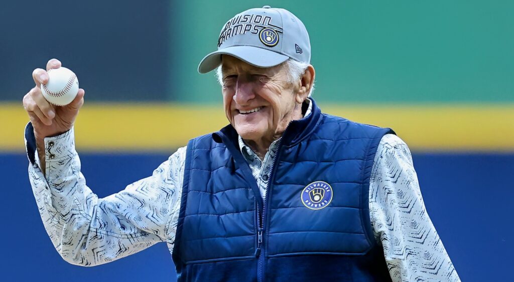 Bob Uecker holding baseball