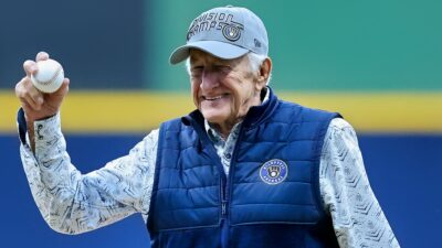 Bob Uecker holding baseball