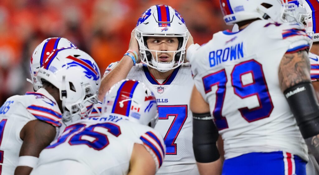 Buffalo Bills players in huddle 