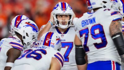 Buffalo Bills players in huddle