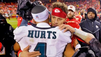 Patrick Mahomes and Jalen Hurts hugging