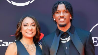 Jayden Daniels and his mother posing at NFL Draft