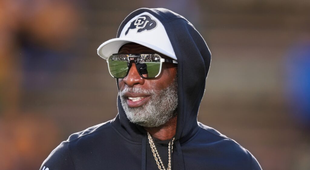 Deion Sanders of Colorado Buffaloes looking on.