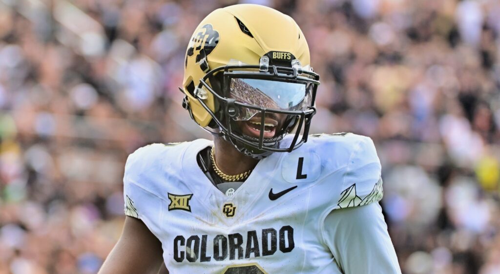 Shedeur Sanders looks on during a game.