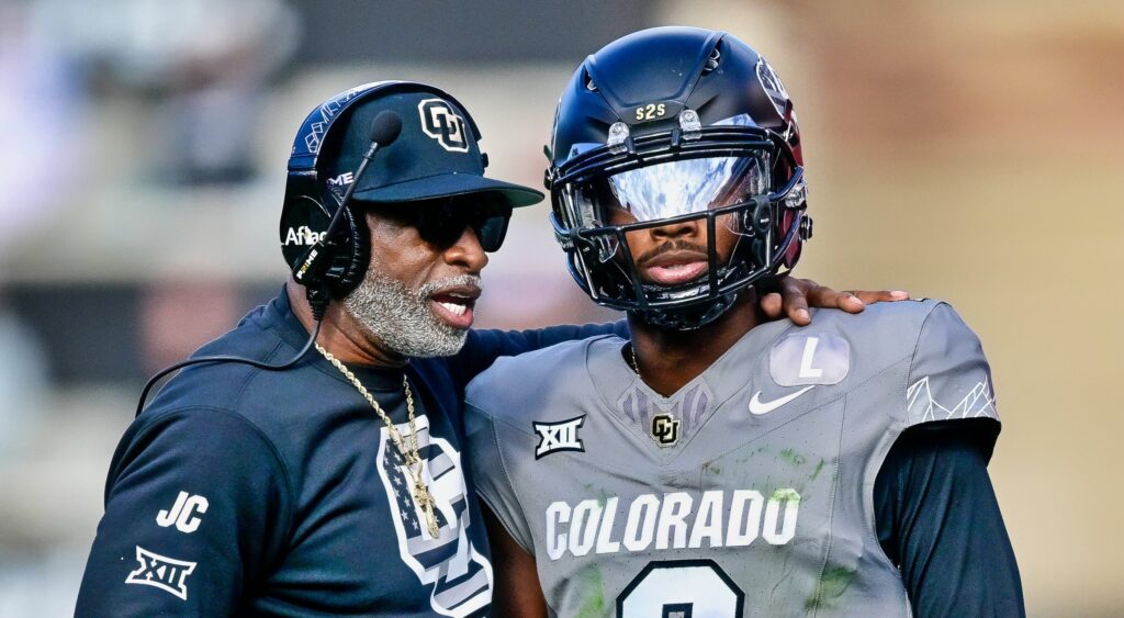 Shedeur Sanders and Deion Sanders on field