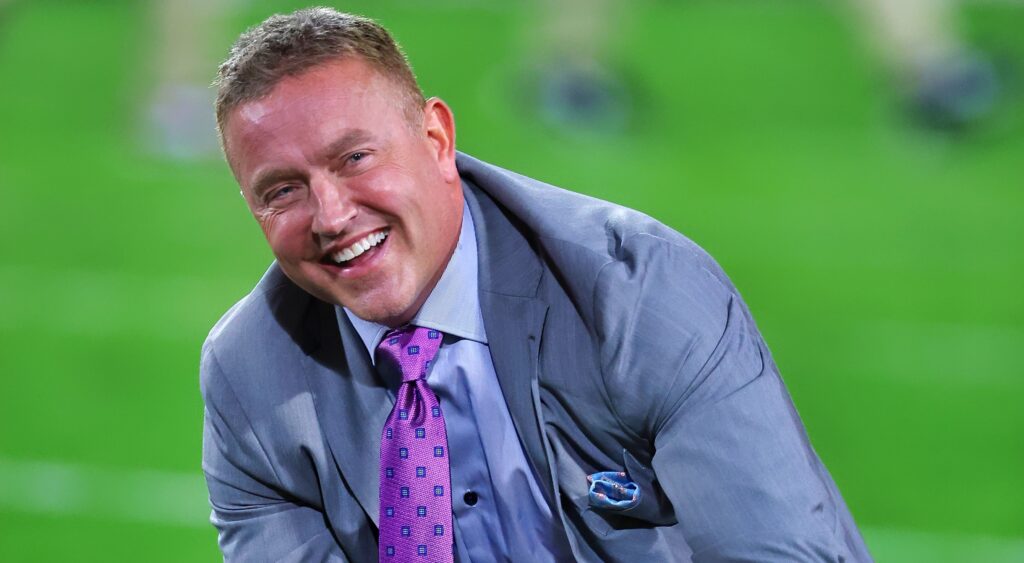 Kirk Herbstreit smiling while on field