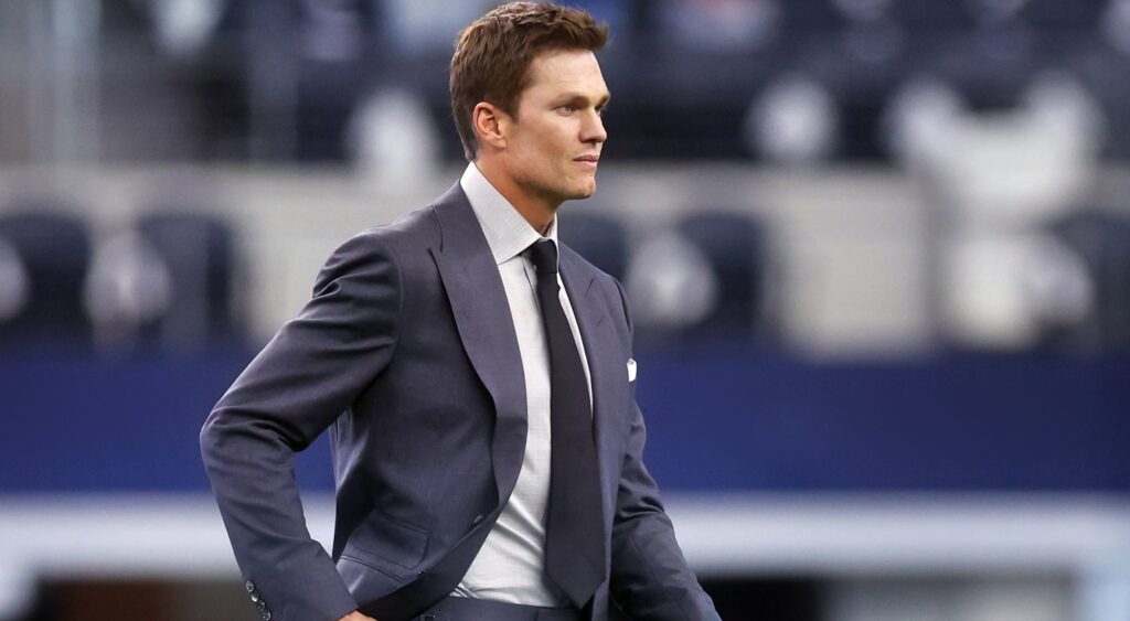 Tom Brady wearing suit