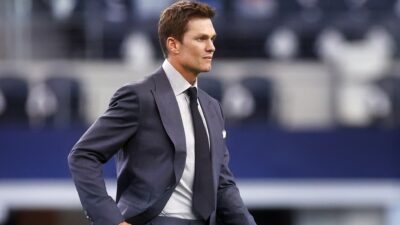 Tom Brady wearing suit