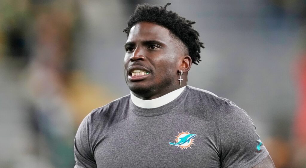 Tyreek Hill in Dolphins shirt