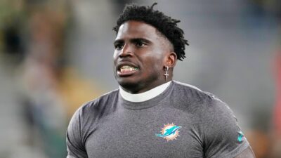 Tyreek Hill in Dolphins shirt