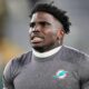 Tyreek Hill in Dolphins shirt