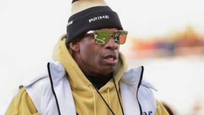 Deion Sanders wearing sunglasses