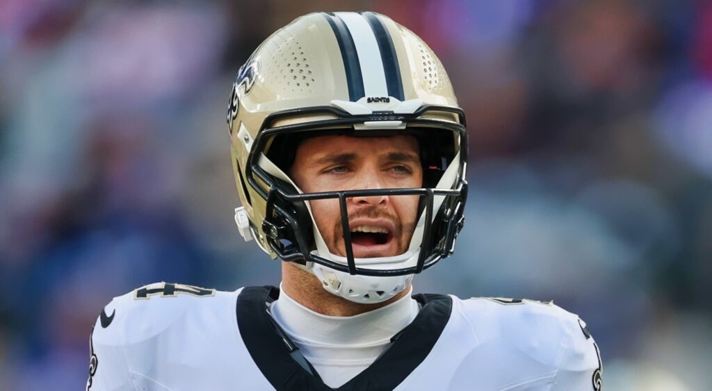 Derek Carr of New Orleans Saints looking on.