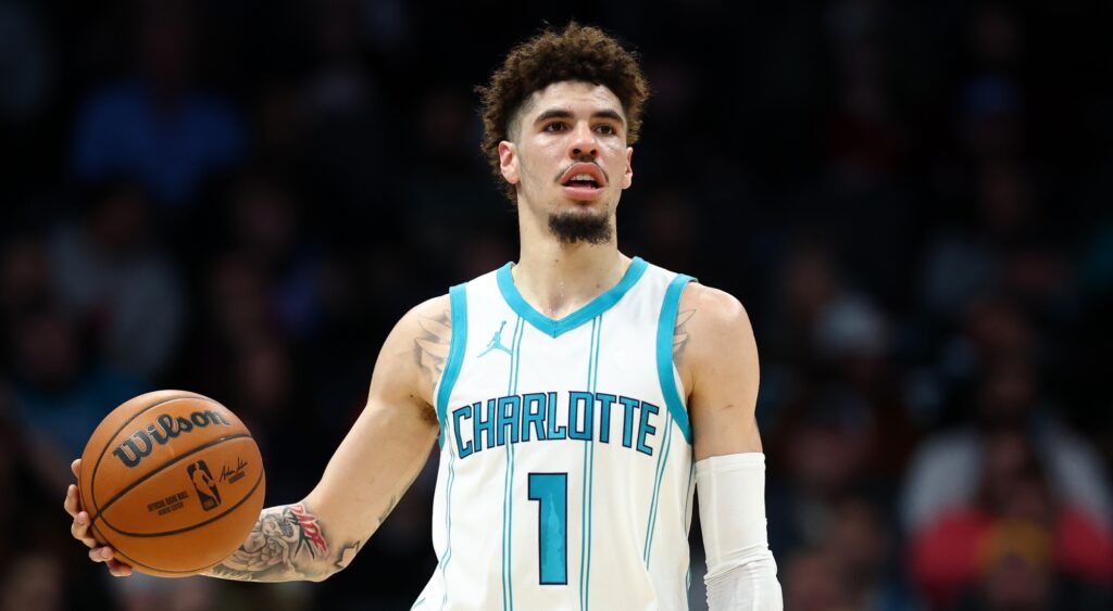 LaMelo Ball looking on during game.