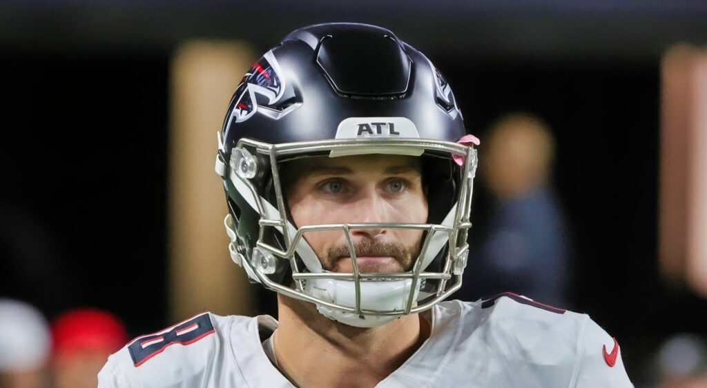 Kirk Cousins of Atlanta Falcons looking on.